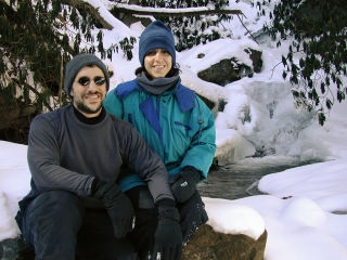 Ken and Gina take a break in front of one of the small frozen waterfalls.