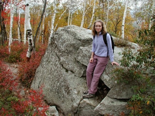 A huge boulder among the birches
