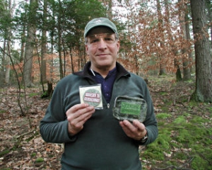 Rich presents his buttons and the cache container!