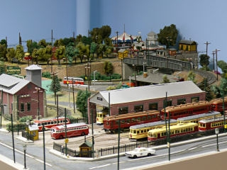 Now we see the real treasures.  Photos can't do justice to this enormous, intricately-detailed layout, but I couldn't resist trying to capture a few of the scenes.  Here we see the LVT trolley shops, some typical Lehigh Valley street scenes, and the park high on the hill.