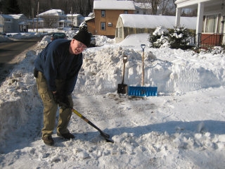 Dad chops and chips and shovels, and probably is not having as much fun as he seems to be.