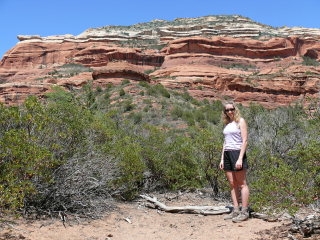 Zhanna is in awe of the crimson cliffs.