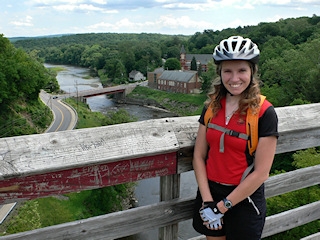Zhanna on trestle, overlooking the town and a much lower bridge.