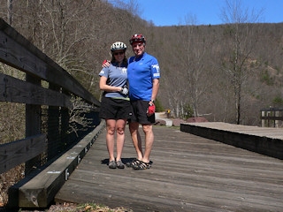 Rich and Zhanna enjoy the sunshine at the bridge at Penn Haven Junction.