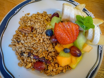 Granola with milk and fresh fruit