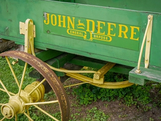 Old John Deere equipment nearby
