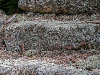 Example of the use of iron rods to secure the granite steps in place
