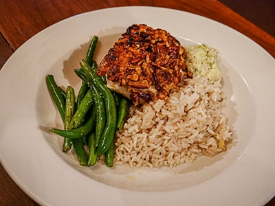 Pecan crusted halibut with green beans and rice pilaf