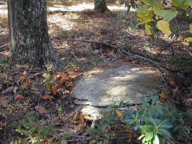 Eye-level view of the mark on the boulder.
