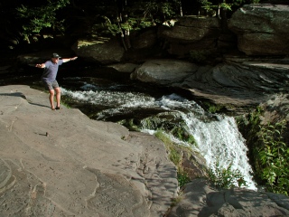 Yikes! Rich prepares to take a flying leap over the falls!